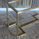 A 1970S ITALIAN BRASS CONSOLE TABLE WITH INSET GLASS TOP, IN THE MANNER OF WILLY RIZZO.