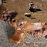 A MID-20TH CENTURY FRENCH COFFEE TABLE IN BURL WOOD.