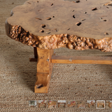 A MID-20TH CENTURY FRENCH COFFEE TABLE IN BURL WOOD.
