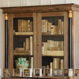 A 19TH CENTURY ENGLISH GEORGE IV BLEACHED ROSEWOD, EBONISED AND GILT BOOKCASE, CIRCA 1830