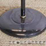 A CHIC 20TH CENTURY FRENCH METAL FLOOR STANDING LIGHT.