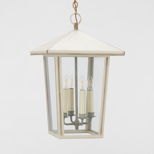 A SQUARE GLAZED HANGING LANTERN WITH PITCHED PAGODA ROOF AND LATER PAINTWORK. 20TH CENTURY.