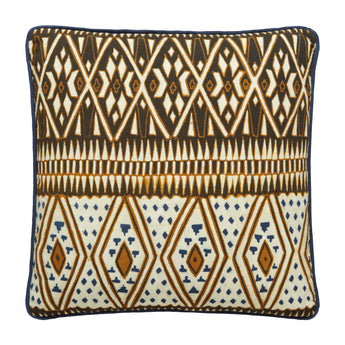 SQUARE CUSHIONS MADE UP FROM A BATIK PANEL IN WHITES AND BROWNS ON A BLUE GROUND BACKED WITH A CHARTREUSE FABRIC.
