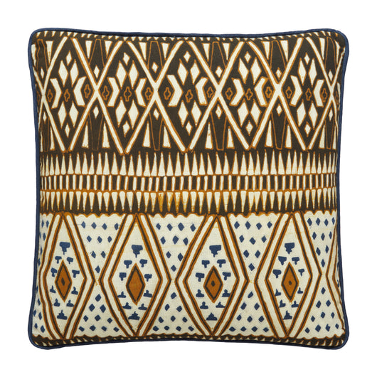 SQUARE CUSHIONS MADE UP FROM A BATIK PANEL IN WHITES AND BROWNS ON A BLUE GROUND BACKED WITH A CHARTREUSE FABRIC.