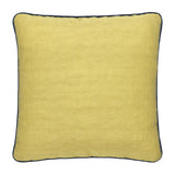 SQUARE CUSHIONS MADE UP FROM A BATIK PANEL IN WHITES AND BROWNS ON A BLUE GROUND BACKED WITH A CHARTREUSE FABRIC.