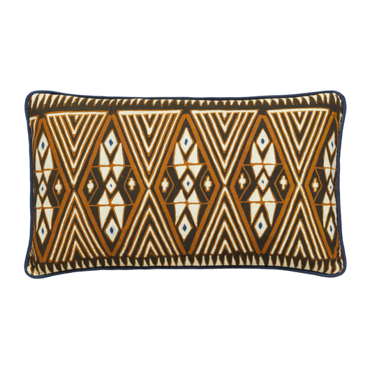 RECTANGULAR LUMBAR CUSHIONS MADE UP FROM A BATIK PANEL IN WHITES AND BROWNS ON A BLUE GROUND BACKED WITH A CHARTREUSE FABRIC.