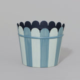 A tole cachepot with scallop rim in a dragged finish stripe design - blue.