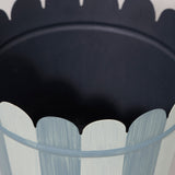 A tole cachepot with scallop rim in a dragged finish stripe design - blue.