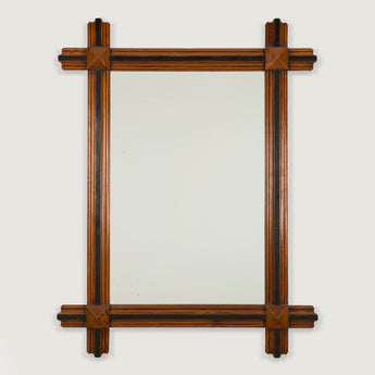 A rectangular pitch-pine framed mirror. French, late 19th century.