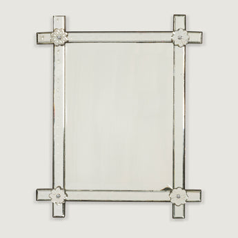 A small 20th century rectangular Venetian glass mirror with cross-over frame, floral bosses to the corners.