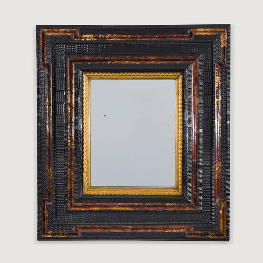 A pair of square mirrors in the 17th century style, with alternate ebonised and tortoiseshell sections.