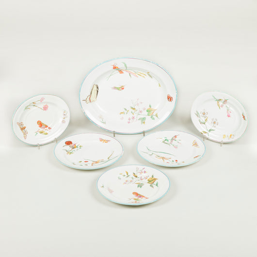 A late 19th century Wedgwood part dinner service decorated with birds, insects and flowers. 41 pieces, some with restorations.