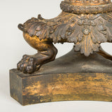 A pair of early 19th century column lamps with fine casting, mounted on paw feet.