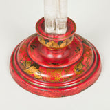 An unusual 1930s column lamp formed of four segmented glass columns set upon a round red lacquer base.