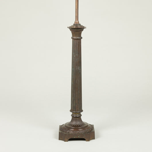 A late 19th or early 20th century bronzed metal column lamp (with slight old damage to fluted column).