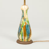 A small French art pottery vase with handles and green, blue and brown marbleised glazing on yellow.