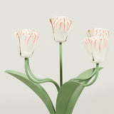 A tole painted tulip candelabra, after an original found in Paris by John Fowler in the 1950's.