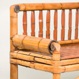 An unusual hall bench made from bent large-gauge sections of bamboo and a split bamboo seat. 20th century.