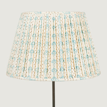 Two gathered silk lampshades in the Bees blue print.