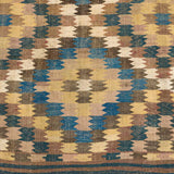 A Veramin kelim rug with a geometric pattern in blue, brown, black and mustard colours. Persian, 19th/20th century.