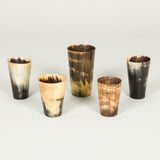 A collection of five horn beakers of varying height. Late 19th C. English circa 1870.