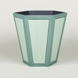 A hexagonal waste paper bin with hand painted faux panel decoration. Paint chart colour No. 3.