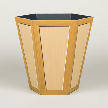 A hexagonal waste paper bin with hand painted faux panel decoration. Paint chart colour No. 9.