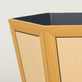 A hexagonal waste paper bin with hand painted faux panel decoration. Paint chart colour No. 9.