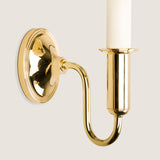 Swan neck wall light. Lacquered Brass.