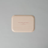 A small Sibyl Colefax and John Fowler birch veneer tray with a classic print design.