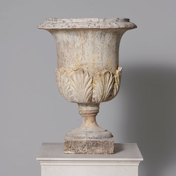 A 19th or early 20th century reconstituted stone garden urn.