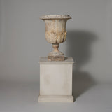 A 19th or early 20th century reconstituted stone garden urn.