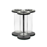 A COMPTON TREFOIL FLOWER HOLDER - BLACK