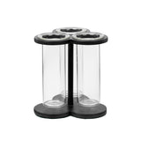 A COMPTON TREFOIL FLOWER HOLDER - BLACK