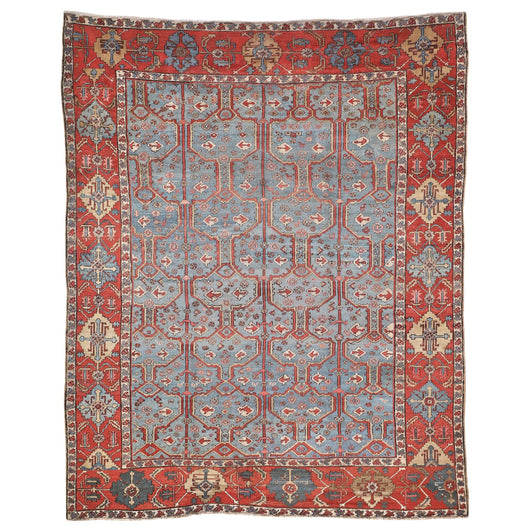 A MID 19TH CENTURY BAKSHAISH CARPET FROM NORTH-WEST PERSIA, THE BOLD GRAPHIC DESIGN ON A RARE SKY BLUE GROUND. CIRCA 1850.