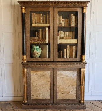 A 19TH CENTURY ENGLISH GEORGE IV BLEACHED ROSEWOD, EBONISED AND GILT BOOKCASE, CIRCA 1830