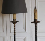 A PAIR OF 1950s SPANISH LEATHER MOUNTED FLOOR LAMPS, REWIRED.