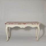 A mid-18th century white-painted Italian console table with red marble top, shaped apron and cabriole legs.