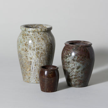 A selection of late 19th century Cornish serpentine stone vases. Varying height and shapes.
