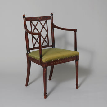 A late 19th/early 20th century Hepplewhite style open armchair with square back and painted floral decoration.