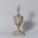 A pair of 18th century carved wood flaming and swagged urn finials, painted finish refreshed.
