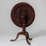 An unusual George III campaign table with round top, extending central support & tripod base, circa 1770.