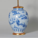 A 18th century Dutch Delft vase with soft blue Chinoiserie decoration, wired as a lamp.