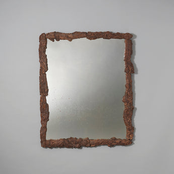 A rectangular cork framed mirror. 20th century.