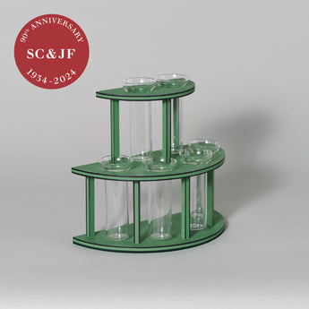 The 90th anniversary two-tier flower holder. A faithful reproduction of John Fowler’s emerald green original bequeathed to the V&A museum.