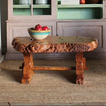 A MID-20TH CENTURY FRENCH COFFEE TABLE IN BURL WOOD.