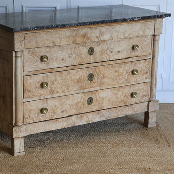 AN EARLY 19TH CENTURY FRENCH EMPIRE BLEACHED ASH COMMODE, WITH ORIGINAL MARBLE TOP.