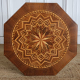 A LATE 19TH / EARLY 20TH ITALIAN OCCASIONAL TABLE WITH OVERALL GEOMETRIC DECORATION IN A VARIETY OF WOODS.