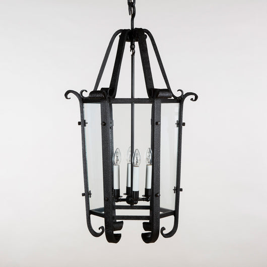 A large hexagonal patinated wrought iron lantern. Continental mid-20th century