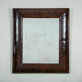 A rectangular oyster-veneered cushion-frame mirror, early 18th century style but probably 19th century.